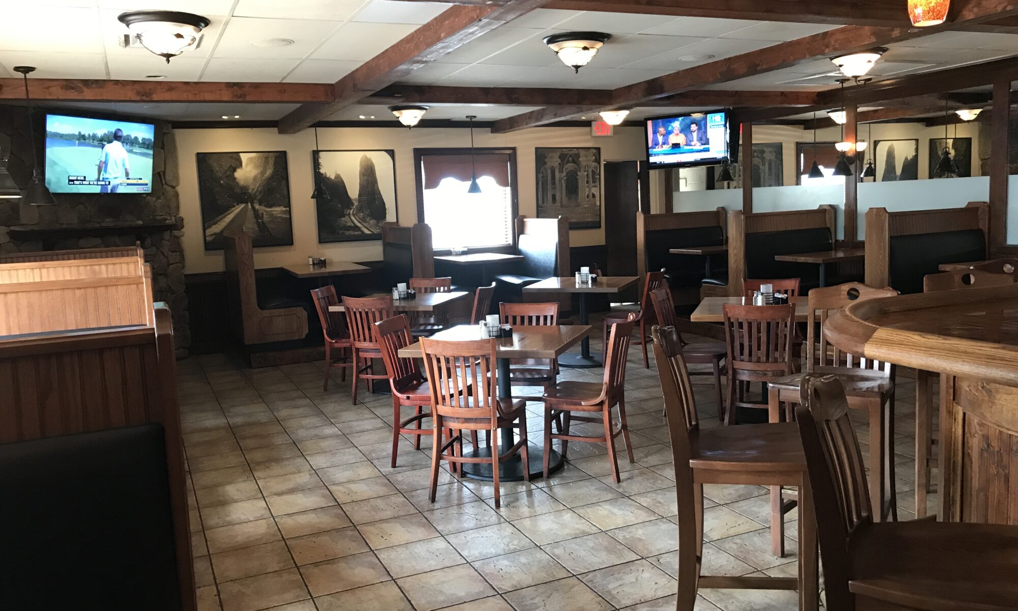 Cozy restaurant interior with wooden furniture.